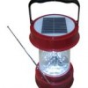 Solar camping lights, multi-functional solar portable lamp with radio, can carry a cell phone charge