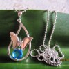 Sterling silver necklace,blue topaz Cubic Zironia pendant