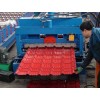 Roof plate forming machine