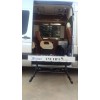 Wheelchair lift for side door of van